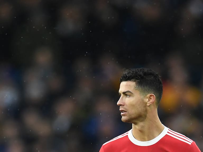 Manchester United's Portuguese striker Cristiano Ronaldo reacts during the English Premier League football match between Leeds United and Manchester United at Elland Road in Leeds, northern England on February 20, 2022. - RESTRICTED TO EDITORIAL USE. No use with unauthorized audio, video, data, fixture lists, club/league logos or 'live' services. Online in-match use limited to 120 images. An additional 40 images may be used in extra time. No video emulation. Social media in-match use limited to 120 images. An additional 40 images may be used in extra time. No use in betting publications, games or single club/league/player publications. (Photo by Paul ELLIS / AFP) / RESTRICTED TO EDITORIAL USE. No use with unauthorized audio, video, data, fixture lists, club/league logos or 'live' services. Online in-match use limited to 120 images. An additional 40 images may be used in extra time. No video emulation. Social media in-match use limited to 120 images. An additional 40 images may be used in extra time. No use in betting publications, games or single club/league/player publications. / RESTRICTED TO EDITORIAL USE. No use with unauthorized audio, video, data, fixture lists, club/league logos or 'live' services. Online in-match use limited to 120 images. An additional 40 images may be used in extra time. No video emulation. Social media in-match use limited to 120 images. An additional 40 images may be used in extra time. No use in betting publications, games or single club/league/player publications. (Photo by PAUL ELLIS/AFP via Getty Images)