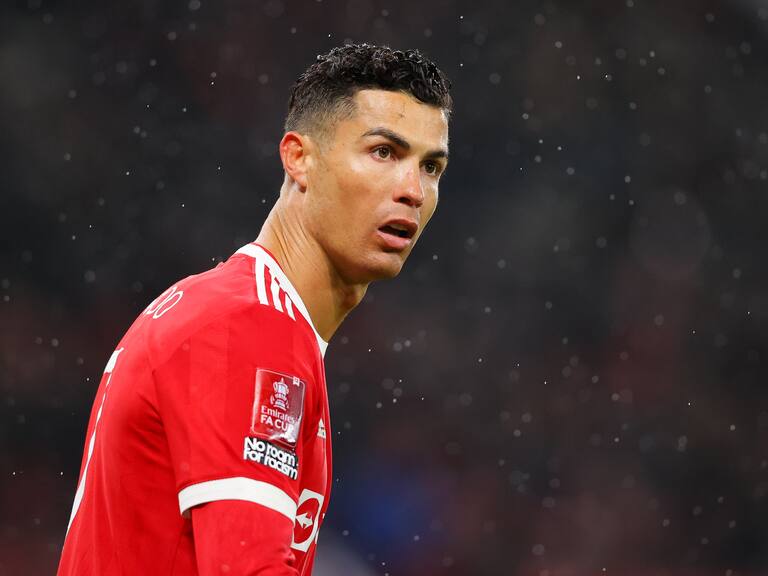 MANCHESTER, ENGLAND - FEBRUARY 04: Cristiano Ronaldo of Manchester United looks on during the Emirates FA Cup Fourth Round match between Manchester United and Middlesbrough at Old Trafford on February 04, 2022 in Manchester, England. (Photo by James Gill - Danehouse/Getty Images)
