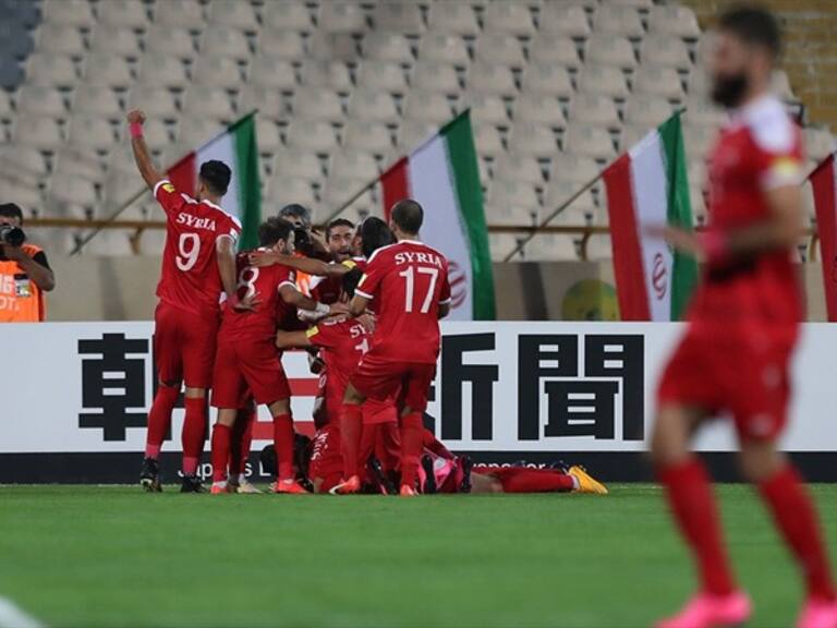 Los jugadores sirios festejan el empate frente a Irán. Foto: Getty Images