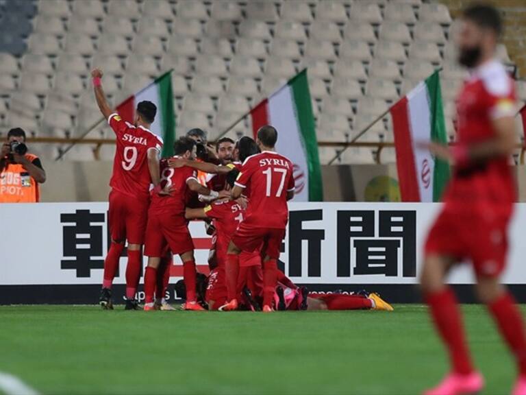 Los jugadores sirios festejan el empate frente a Irán. Foto: Getty Images