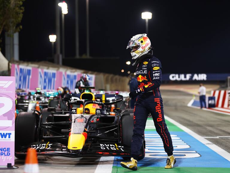 BAHRAIN, BAHRAIN - MARCH 19: Second place qualifier Max Verstappen of the Netherlands and Oracle Red Bull Racing walks from his car in parc ferme during qualifying ahead of the F1 Grand Prix of Bahrain at Bahrain International Circuit on March 19, 2022 in Bahrain, Bahrain. (Photo by Lars Baron/Getty Images)