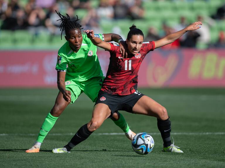 MELBOURNE, AUSTRALIA - JULY 21: Osinachi Ohale of Nigeria and Evelyne Viens of Canada in action during the FIFA Women's World Cup Australia & New Zealand 2023 Group B match between Nigeria and Canada at Melbourne Rectangular Stadium on July 21, 2023 in Melbourne, Australia. (Photo by Joe Prior/Visionhaus via Getty Images)