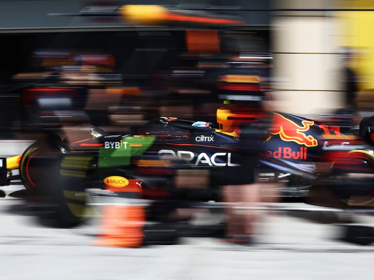BAHRAIN, BAHRAIN - MARCH 12: Sergio Perez of Mexico driving the (11) Oracle Red Bull Racing RB18 makes a pitstop during Day Three of F1 Testing at Bahrain International Circuit on March 12, 2022 in Bahrain, Bahrain. (Photo by Mark Thompson/Getty Images)
