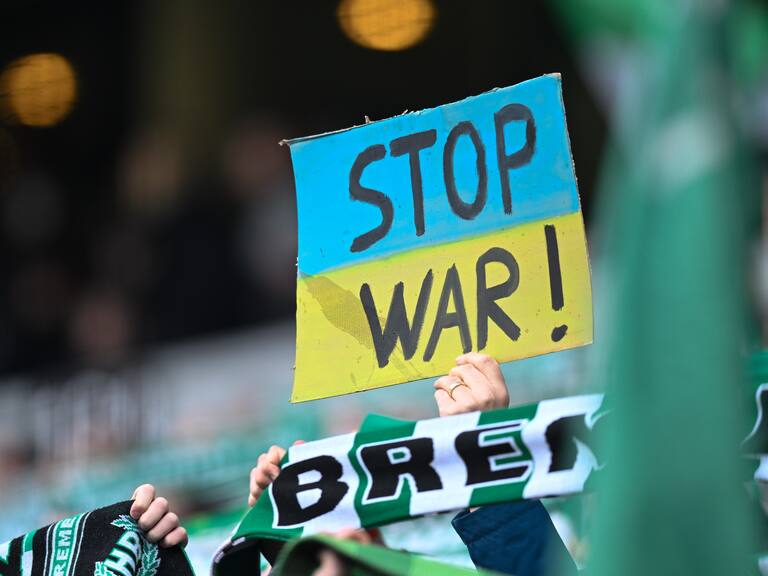 BREMEN, GERMANY - MARCH 06: . SV Werder Bremen fans raise a placard with the words Stop War! during the Second Bundesliga match between SV Werder Bremen and SG Dynamo Dresden at Wohninvest Weserstadion on March 6, 2022 in Bremen, Germany. (Photo by Mario Hommes/DeFodi Images via Getty Images)