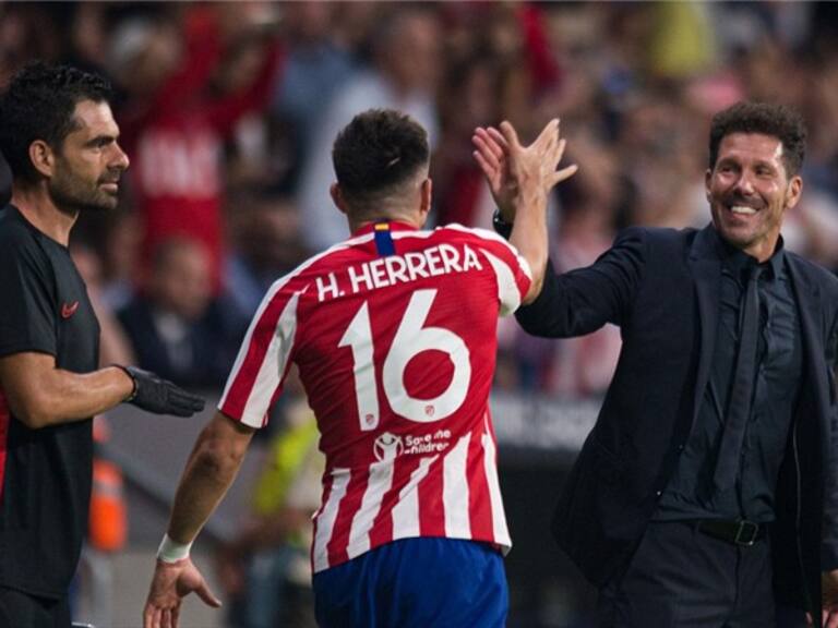 Héctor Herrera y Diego Simeone. Foto: Getty