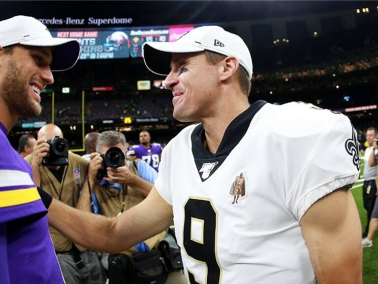 Kirk Cousins y Drew Brees. Foto: Getty Images