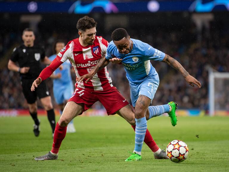 MANCHESTER, ENGLAND - APRIL 05: Raheem Sterling of Manchester City and ime Vrsaljko of Atletico Madrid in action during the UEFA Champions League Quarter Final Leg One match between Manchester City and Atletico Madrid at City of Manchester Stadium on April 5, 2022 in Manchester, United Kingdom. (Photo by Visionhaus/Getty Images)