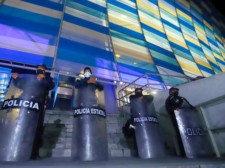 PUEBLA, MEXICO - MARCH 18: Police officers stand guard prior to the 11th round match between Puebla and Santos Laguna as part of the Torneo Grita Mexico C22 Liga MX at Cuauhtemoc Stadium on March 18, 2022 in Puebla, Mexico. (Photo by Jam Media/Getty Images)