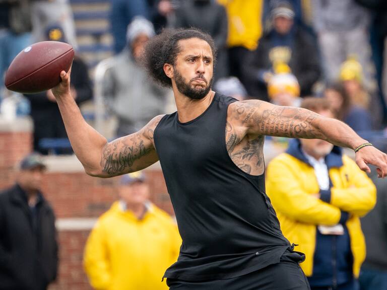 ANN ARBOR, MI - APRIL 02: Colin Kaepernick participates in a throwing exhibition during half time of the Michigan spring football game at Michigan Stadium on April 2, 2022 in Ann Arbor, Michigan. (Photo by Jaime Crawford/Getty Images)