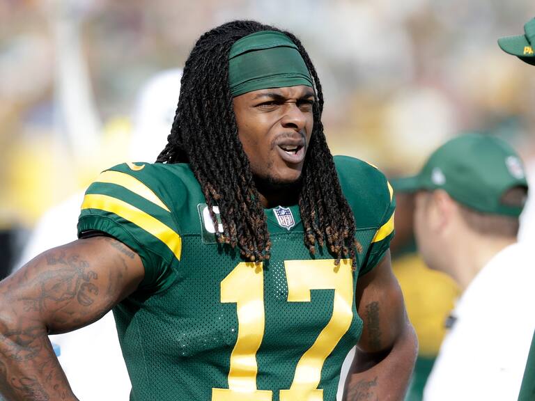 GREEN BAY, WISCONSIN - OCTOBER 24: Davante Adams #17 of the Green Bay Packers looks on from the bench against the Washington Football Team at Lambeau Field on October 24, 2021 in Green Bay, Wisconsin. Green Bay defeated Washington 24-10. (Photo by John Fisher/Getty Images)