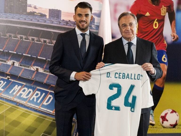 Dani Ceballos acompañado de Florentino Pérez. Foto: Getty Images