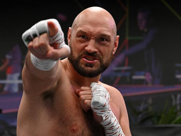 World Boxing Council (WBC) heavyweight title holder Britain's Tyson Fury takes part in an open work-out session in Wembley, west London, on April 19, 2022. - Tyson Fury is set to have his first bout on home soil in nearly four years when he defends his World Boxing Council (WBC) heavyweight title in an all-British clash against Dillian Whyte at Wembley Stadium on April 23. (Photo by JUSTIN TALLIS / AFP) (Photo by JUSTIN TALLIS/AFP via Getty Images)