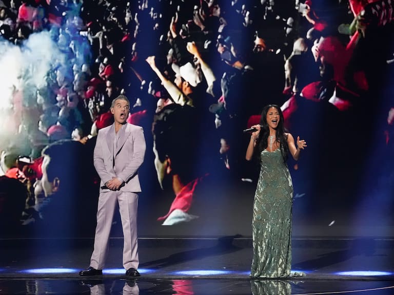 WASHINGTON, DC - DECEMBER 05: Robbie Williams and Nicole Scherzinger perform the World Cup anthem during the FIFA World Cup 2026 Official Draw at John F. Kennedy Center for the Performing Arts on December 05, 2025 in Washington, DC. (Photo by Brad Smith/ISI Photos/ISI Photos via Getty Images)