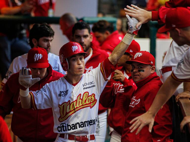 MEXICO CITY, MEXICO - SEPTEMBER 11: Carlos Figueroa of Diablos Rojos celebrates with teammates during a match between Tigres de Quintana Roo and Diablos Rojos as part of the Liga Mexicana de Beisbol 2019 at Alfredo Harp Hel Stadium on September 11, 2019 in Mexico City, Mexico. (Photo by Angel Castillo/Jam Media/Getty Images)