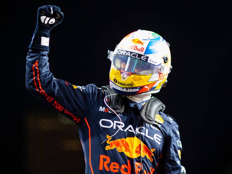 JEDDAH, SAUDI ARABIA - MARCH 26: Pole position qualifier Sergio Perez of Mexico and Oracle Red Bull Racing celebrates in parc ferme after qualifying ahead of the F1 Grand Prix of Saudi Arabia at the Jeddah Corniche Circuit on March 26, 2022 in Jeddah, Saudi Arabia. (Photo by Dan Istitene - Formula 1/Formula 1 via Getty Images)