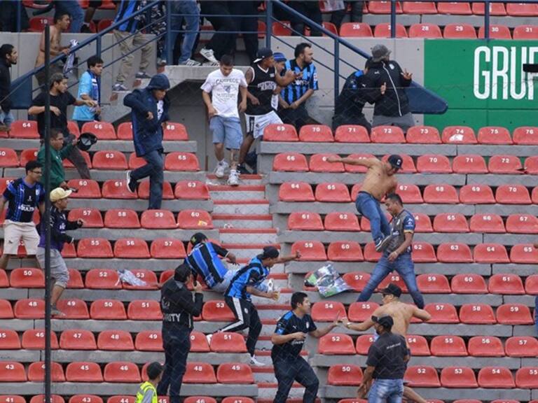 Violencia en el Estadio Alfonso Lastras. Foto: GettyImages