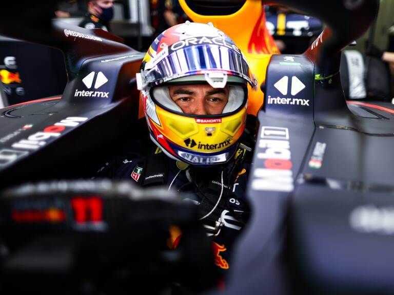 BAHRAIN, BAHRAIN - MARCH 12: Sergio Perez of Mexico and Oracle Red Bull Racing prepares to drive in the garage during Day Three of F1 Testing at Bahrain International Circuit on March 12, 2022 in Bahrain, Bahrain. (Photo by Mark Thompson/Getty Images)